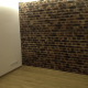Moderner Innenausbau, indirekte Beleuchtung, GKF Steinpaneele Lodrillo Loft, Echtholzparkett Eiche